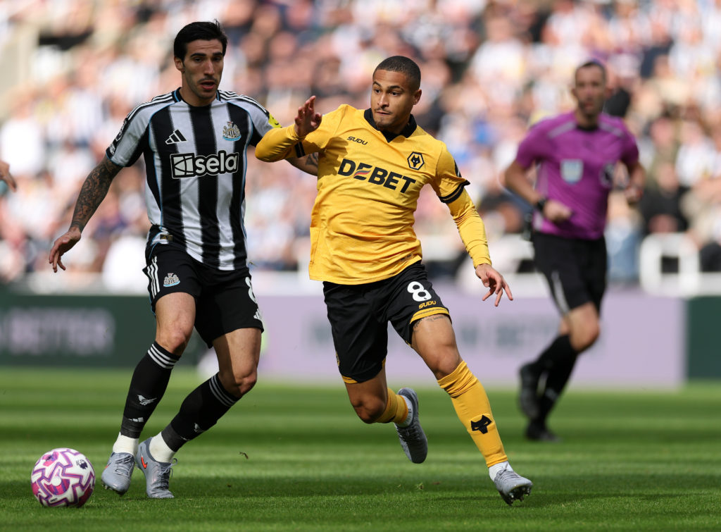 Sandro Tonali tussles for the ball during a Premier League game between Newcastle United and Wolves.