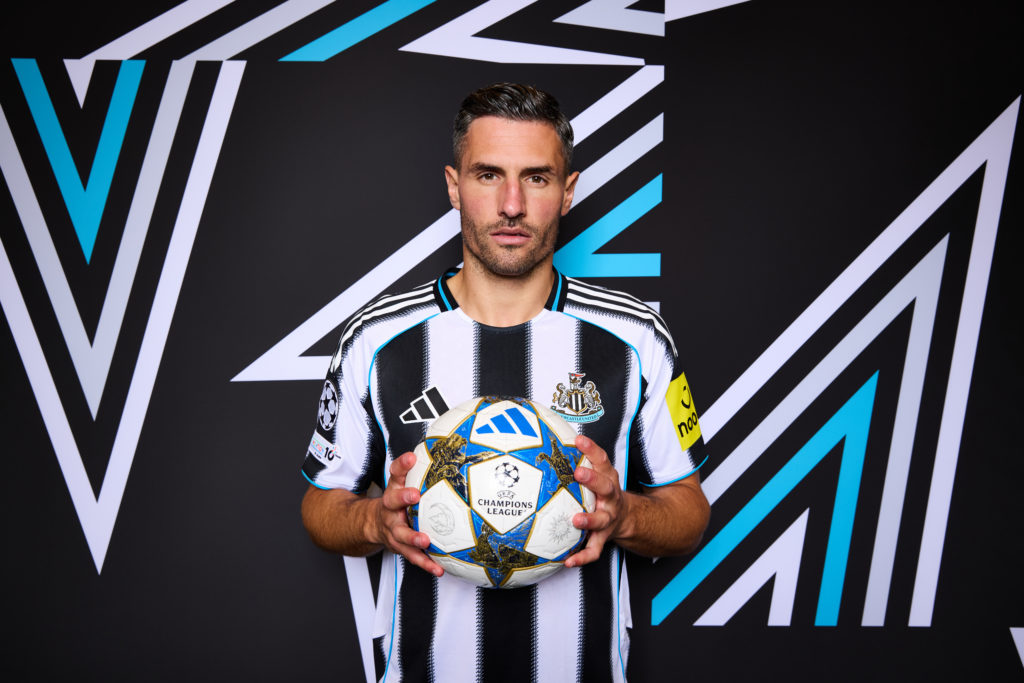 Fabian Schar poses with a ball during Newcastle United's Champions League photoshoot.