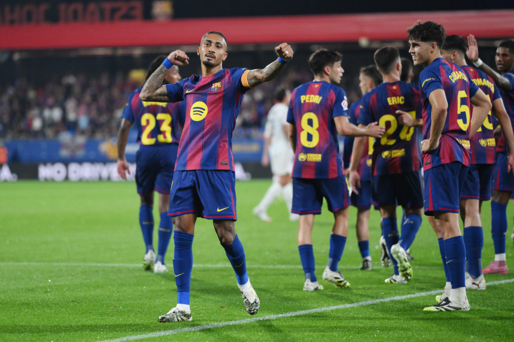 Raphinha celebrates scoring for Barcelona against Valencia in La Liga.