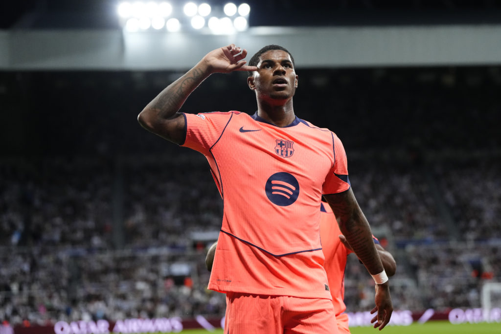 Marcus Rashford celebrates a goal for Barcelona against Newcastle United.