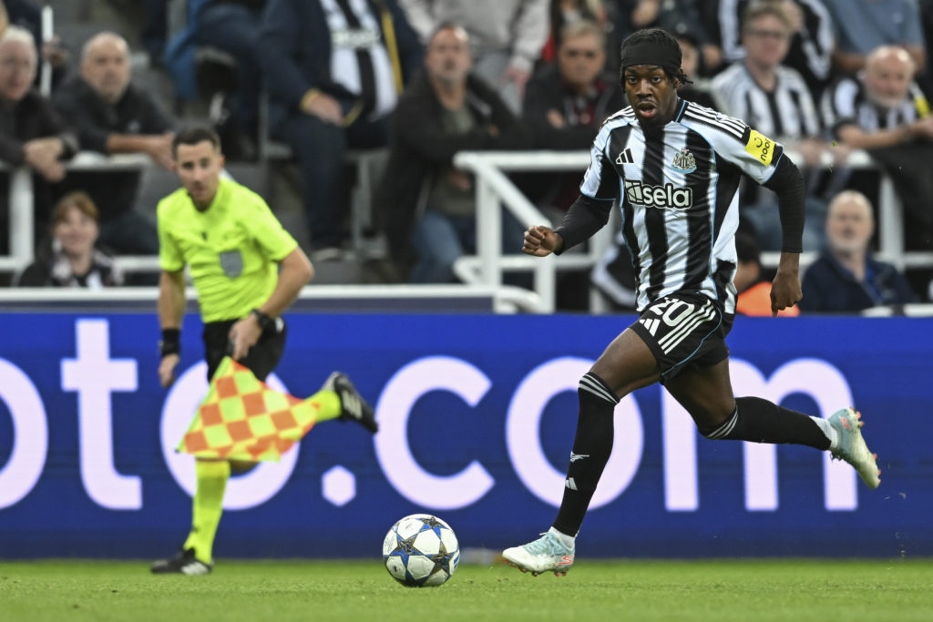 Anthony Elanga drives with the ball during a Champions League game between Newcastle United and Barcelona.