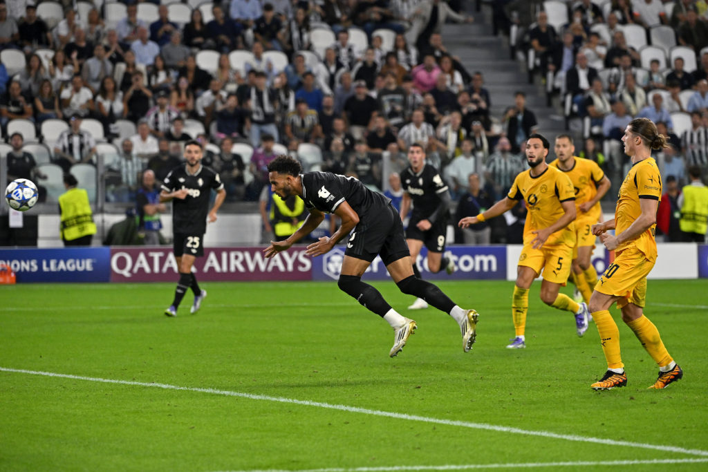 Lloyd Kelly scores a diving header to make it 4-4 in the Champions League between Juventus and Borussia Dortmund.