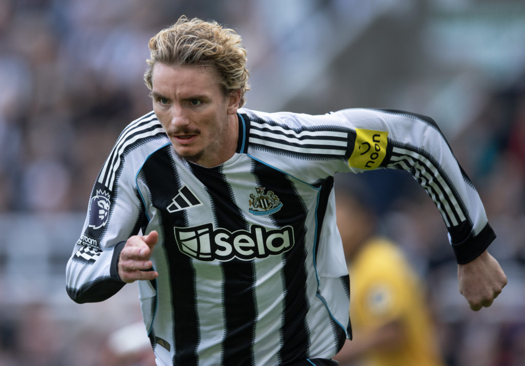 Nick Woltemade chases the ball during his Newcastle United debut against Wolves.
