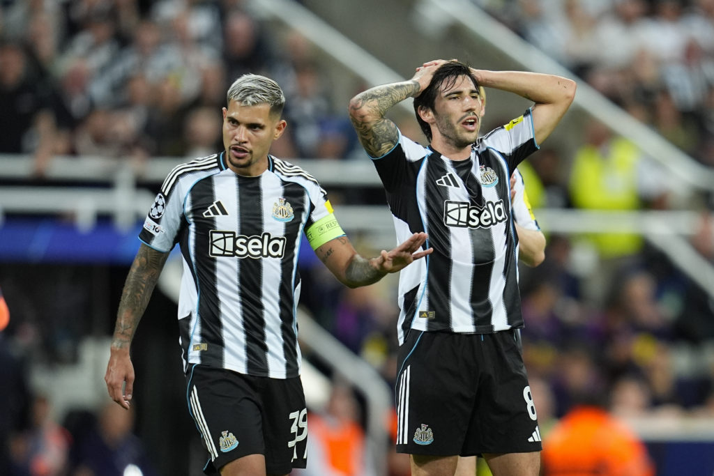Bruno Guimaraes and Sandro Tonali react during Newcastle United vs Barcelona in the Champions League.