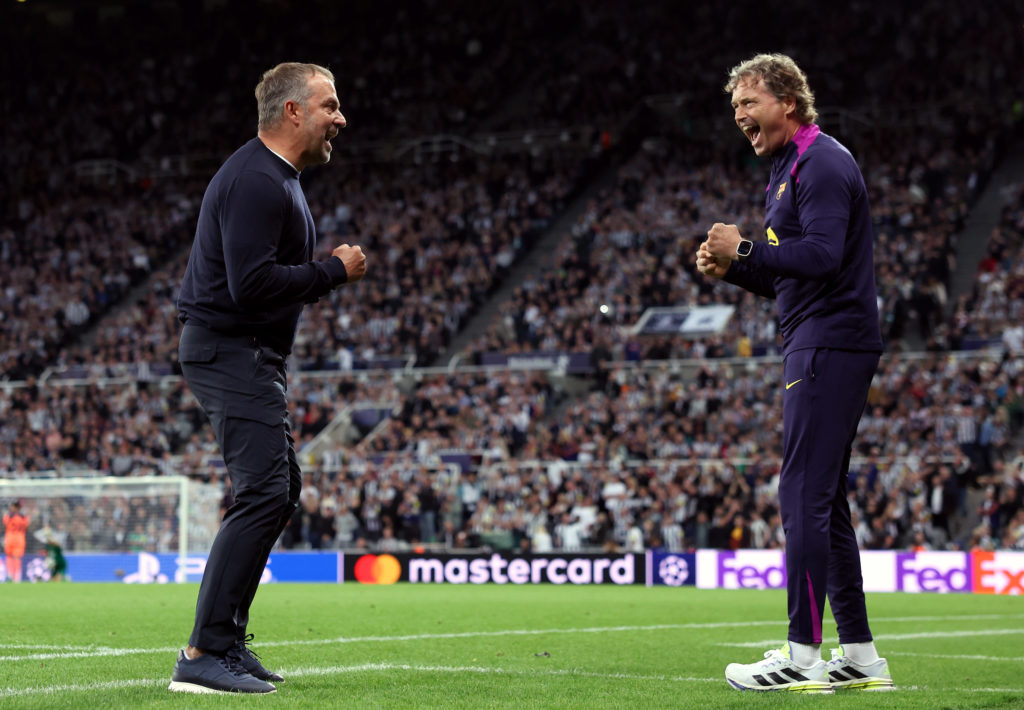 FC Barcelona head coach Hansi Flick celebrates at Newcastle United's St James' Park.