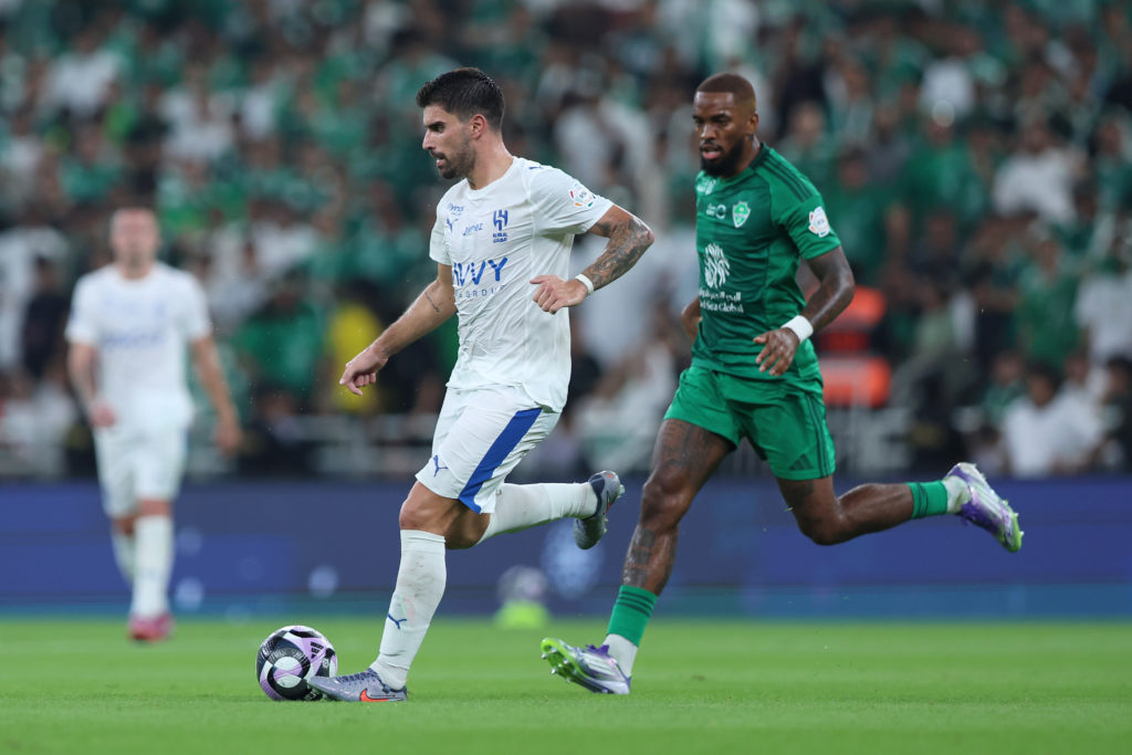 Ruben Neves attempts a pass during a Saudi Pro League game between Al Ahli and Al-Hilal.