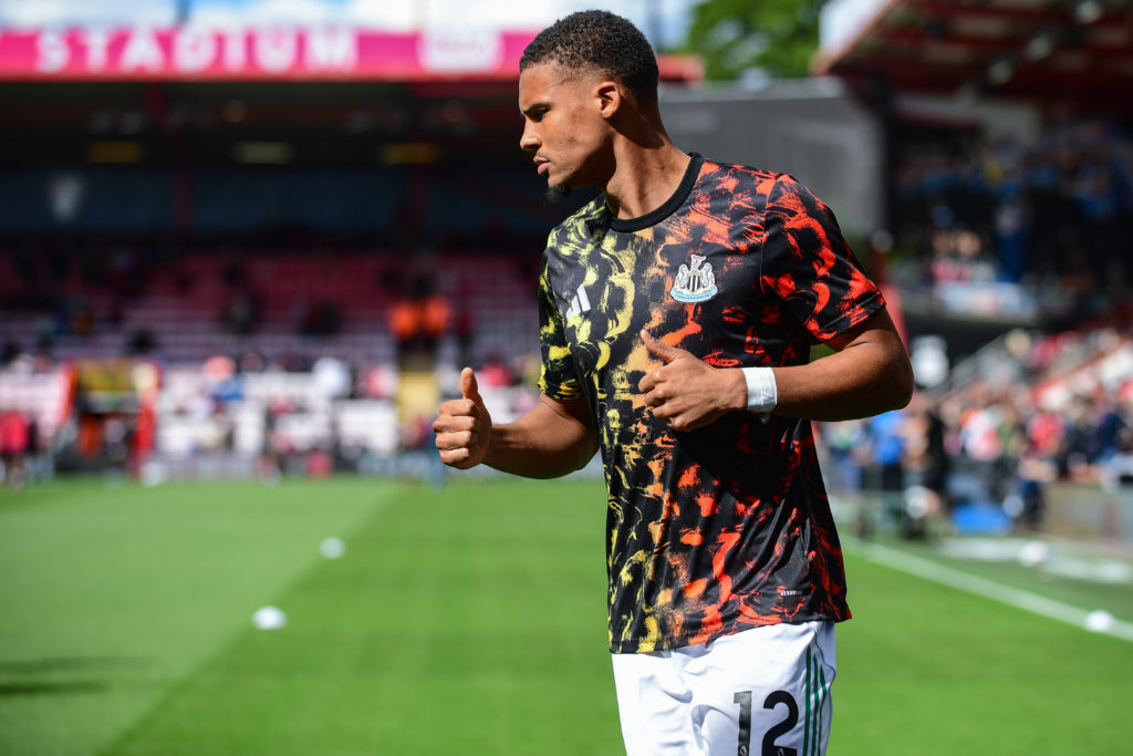 Malick Thiaw warms up before a Premier League game between Bournemouth and Newcastle United.