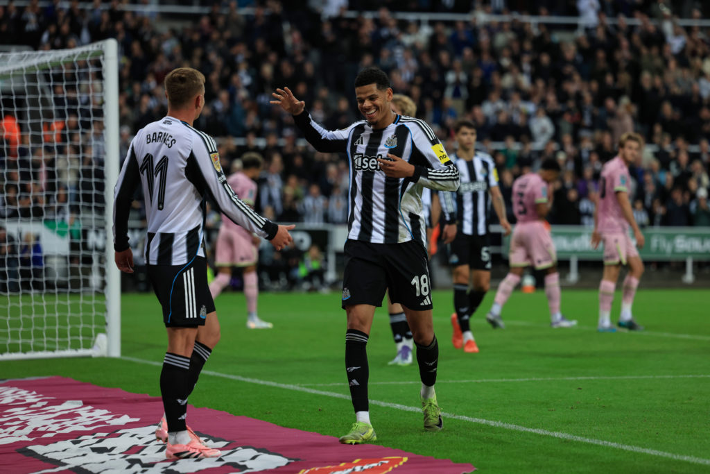 Will Osula celebrates with Harvey Barnes after scoring his second goal in Newcastle United's win over Bradford City.