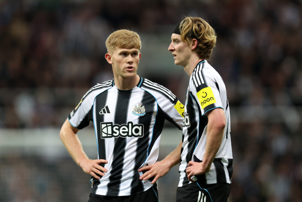 Lewis Hall speaks to Anthony Gordon during Newcastle United's Carabao Cup win over Bradford City.