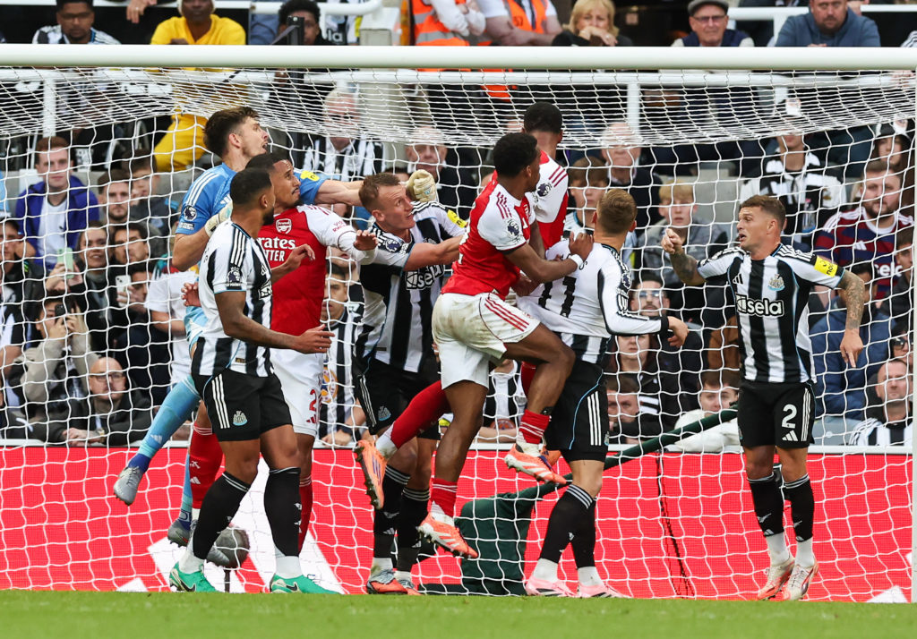 Dan Burn and other Newcastle United players are unable to stop Gabriel scoring for Arsenal.