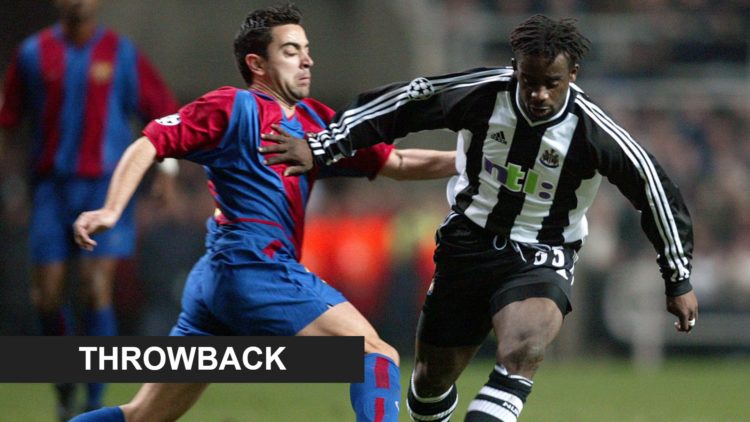 Olivier Bernard and Xavi challenge each other during Newcastle United vs Barcelona.
