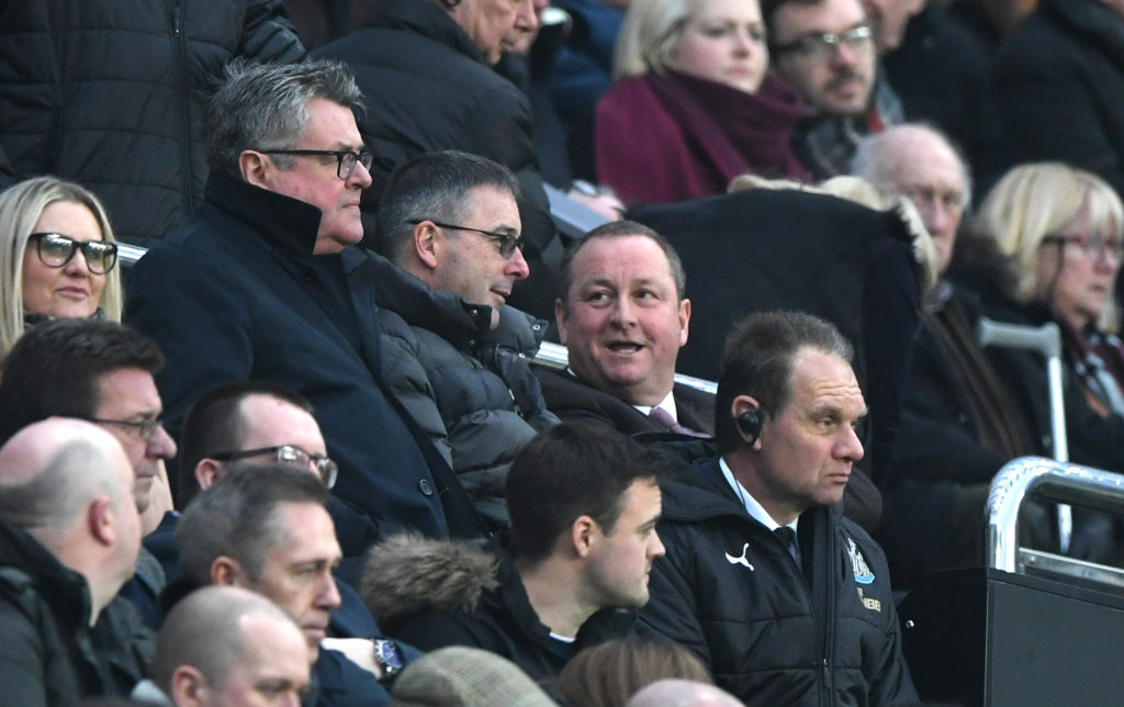 Mike Ashley watches Newcastle United play against Cardiff City during his time as owner.