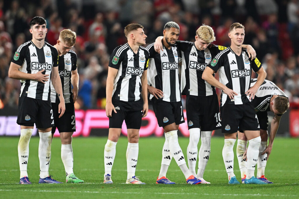 Newcastle United players react during a Carabao Cup penalty shootout against Nottingham Forest.