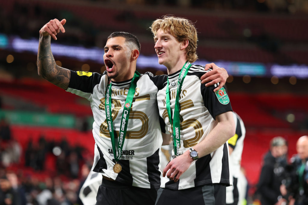Newcastle United's Bruno Guimaraes and Anthony Gordon celebrate winning the Carabao Cup final against Liverpool