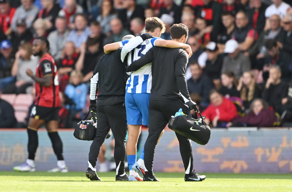 Jack Hinshellwood helped off the field after suffering an injury.