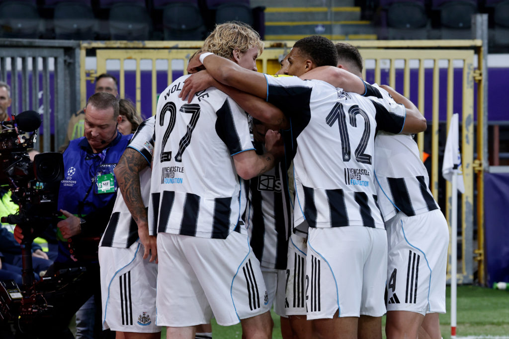 Newcastle United players celebrate scoring against Union Saint-Gilloise in the Champions League.