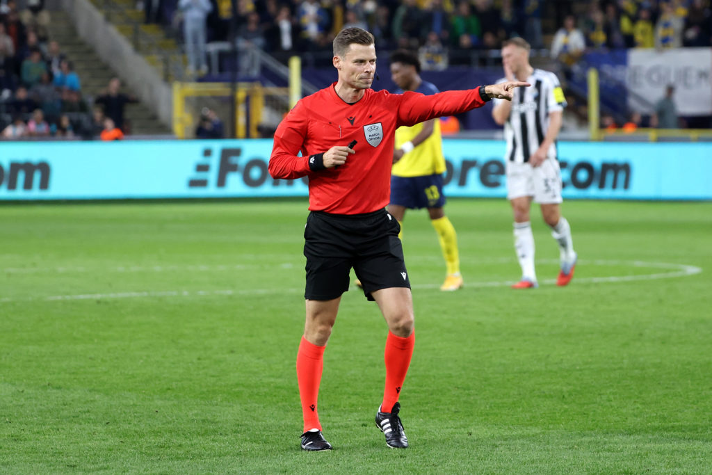 Urs Schnyder gives Newcastle United a penalty against Union Saint-Gilloise in the Champions League.