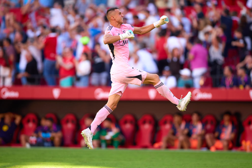Sevilla goalkeeper Odysseas Vlachodimos celebrates against FC Barcelona