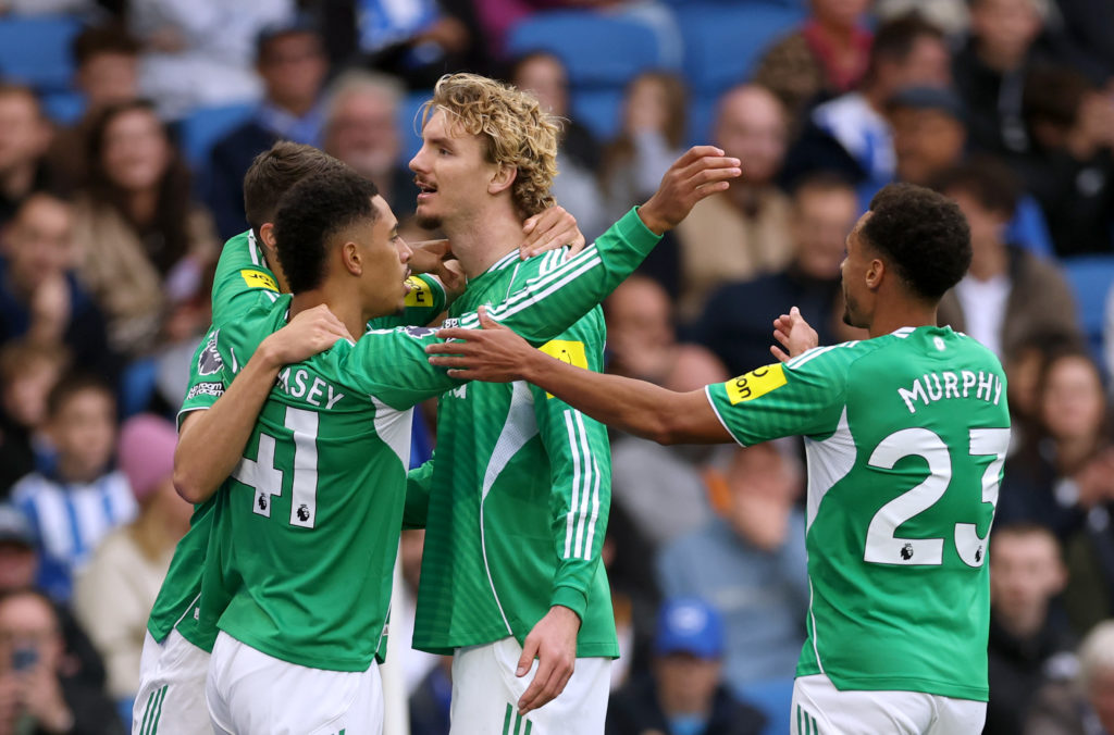 Nick Woltemade celebrates with his teammates after scoring for Newcastle United against Brighton.