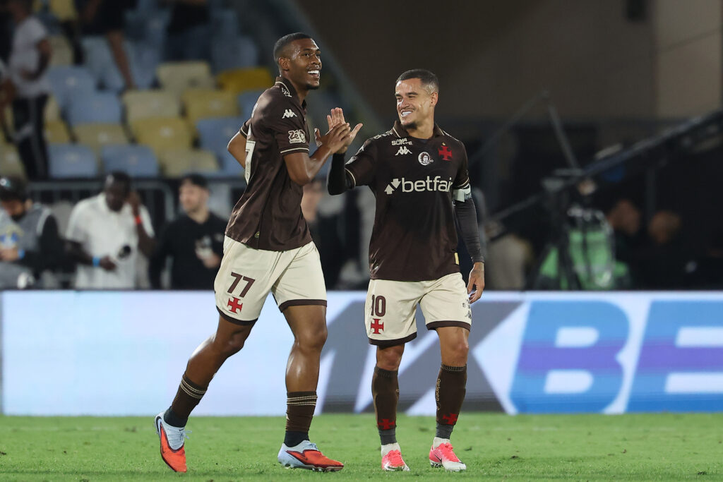 Rayan celebrates with teammate Philippe Coutinho after scoring for Vasco da Gama.