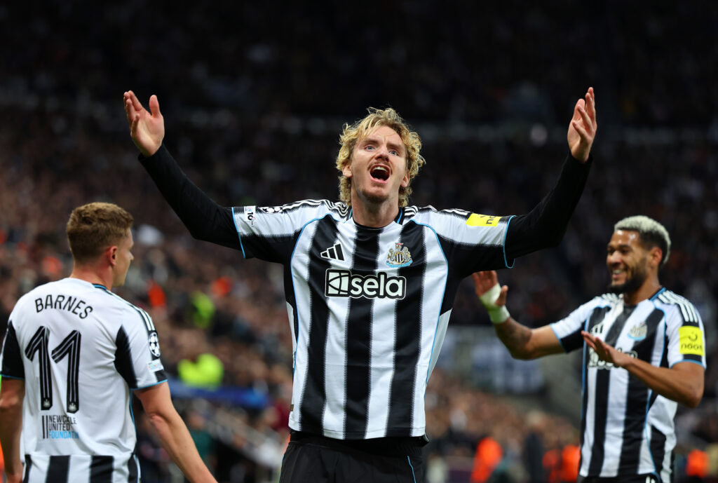 Nick Woltemade gestures to the crowd after Harvey Barnes' goal for Newcastle United against Benfica.