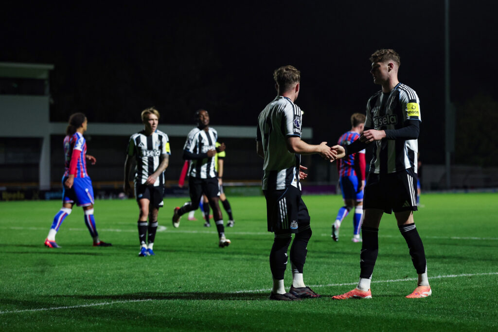 Joe Brayson celebrates with Alex Murphy during Newcastle United Under-21s' game against Crystal Palace Under-21s.
