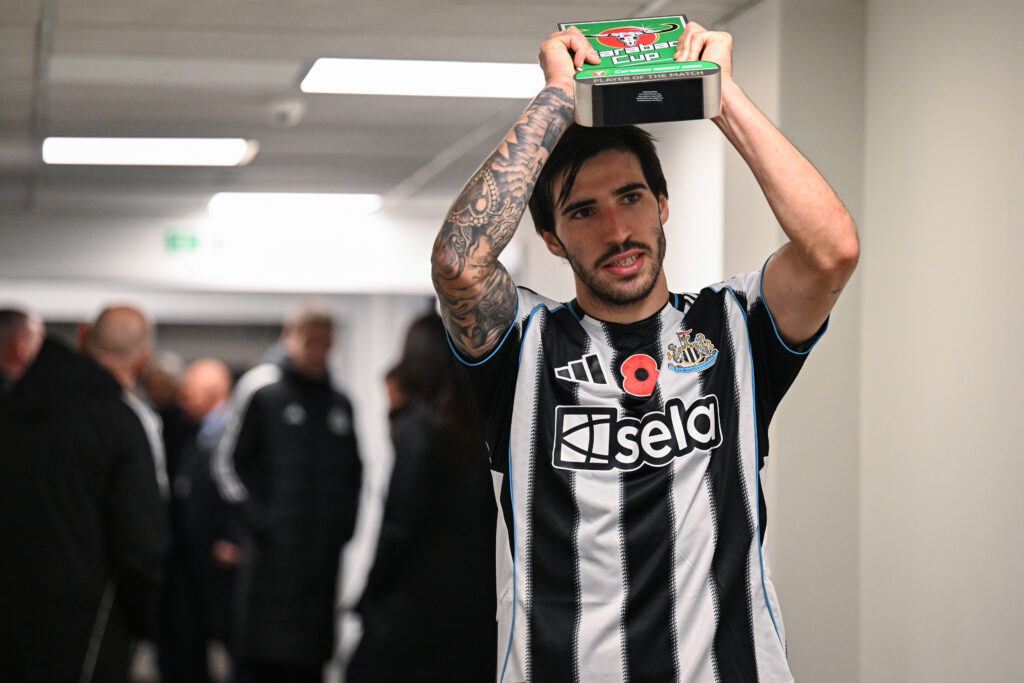 Sandro Tonali holds up his player of the match award after Newcastle United beat Tottenham in the Carabao Cup.