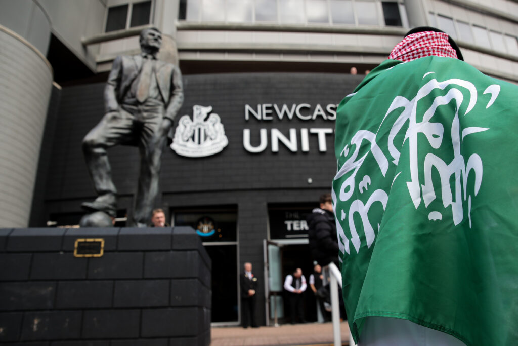Newcastle United fans celebrate their takeover by the Saudi Public Investment Fund (PIF