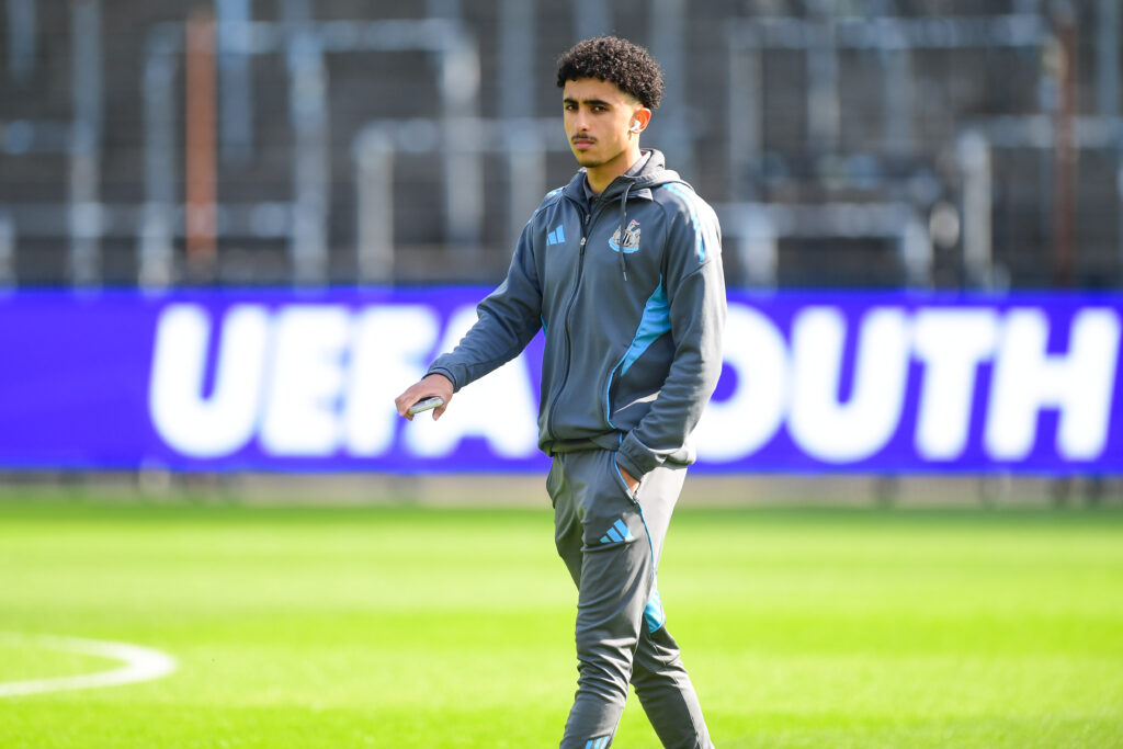 Mohamed Waddani in a Newcastle United tracksuit.