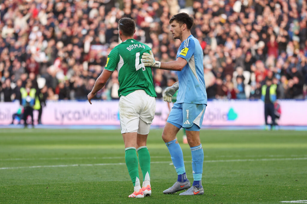Nick Pope consoles Sven Botman after scoring an own goal for Newcastle United against West Ham.