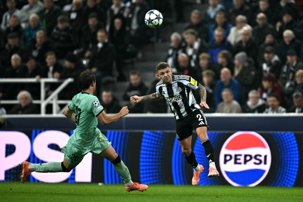 Kieran Trippier heads the ball during Newcastle United's Champions League game against Athletic Club.