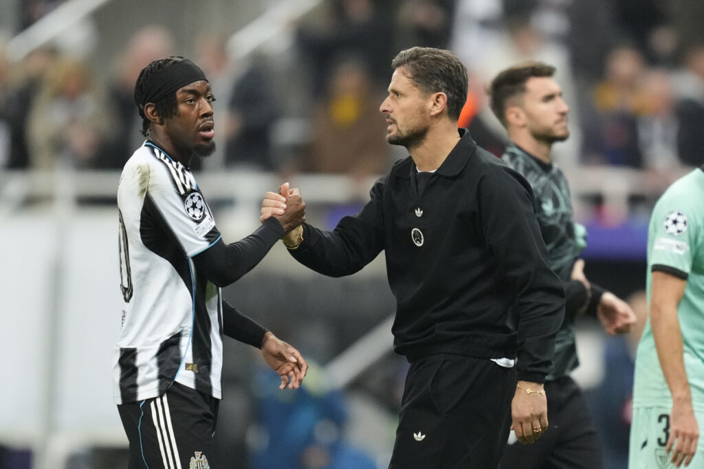 Anthony Elanga shakes hands with Jason Tindall after Newcastle United's Champions League win vs Athletic Club.
