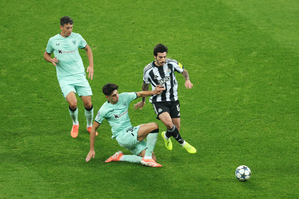 Sandro Tonali in action against Athletic Club in the Champions League.