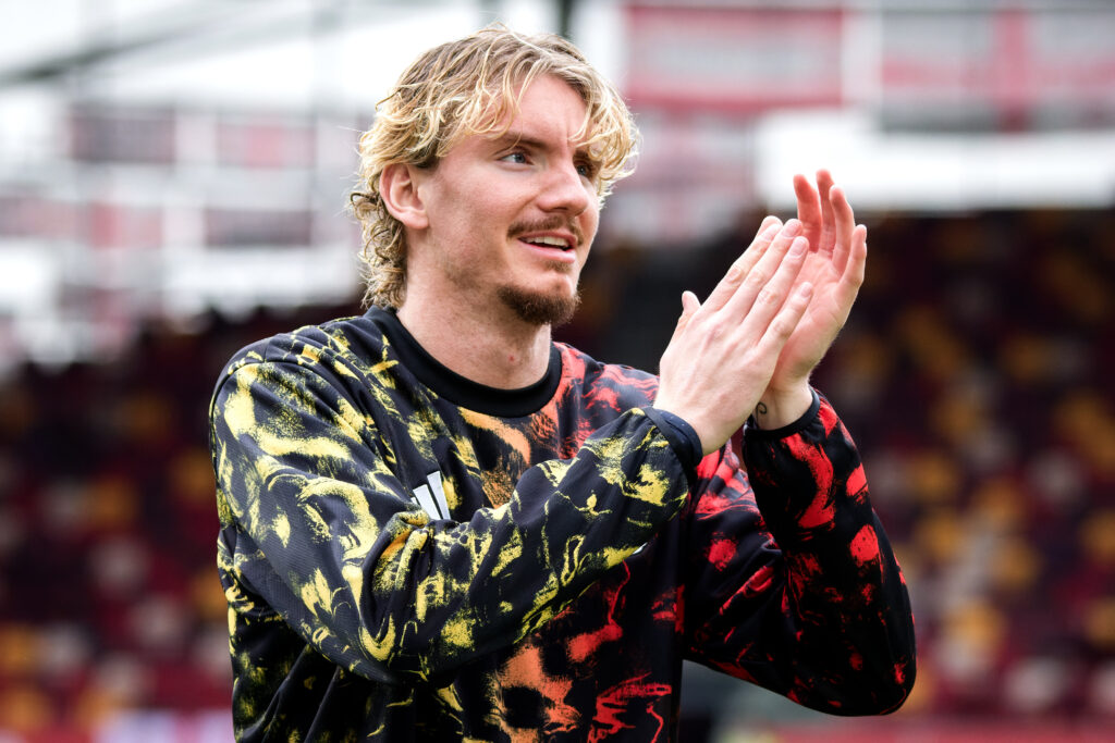 Nick Woltemade warms up before Newcastle United's game against Brentford.