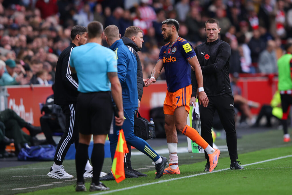 Joelinton shakes Eddie Howe's hand after coming off for Newcastle United against Brentford.