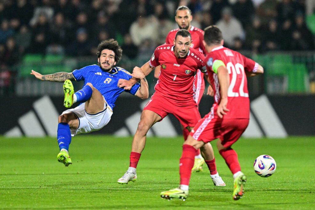Sando Tonali is knocked off the ball during Italy's 2026 FIFA World Cup qualifier against Moldova.