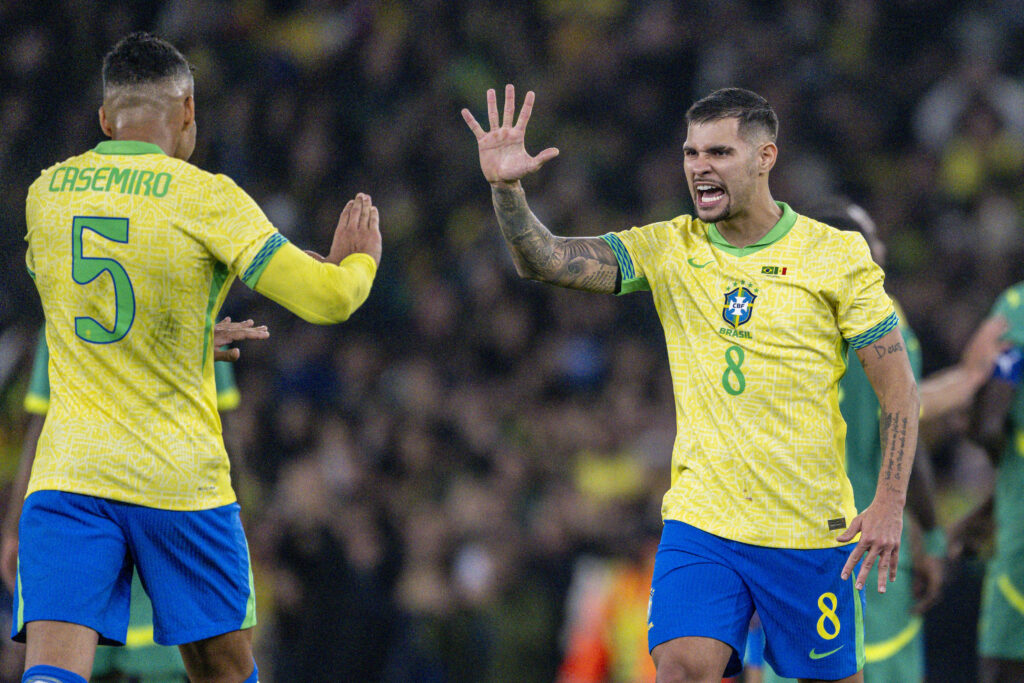 Bruno Guimaraes gestures towards Casemiro during Brazil's international friendly against Senegal.