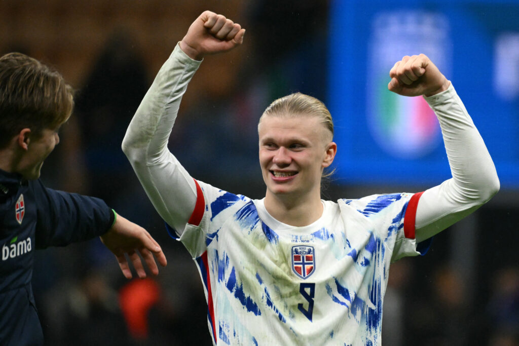 Erling Haaland celebrates as Norway qualify for the World Cup.