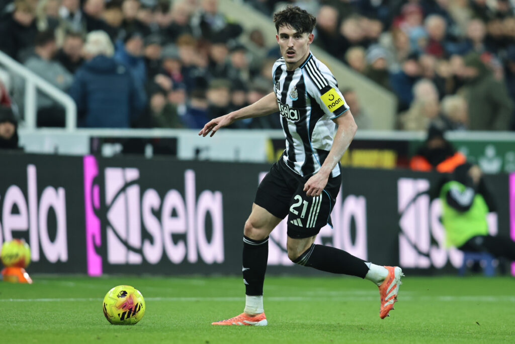 Tino Livramento runs with the ball during Newcastle United vs Manchester City.
