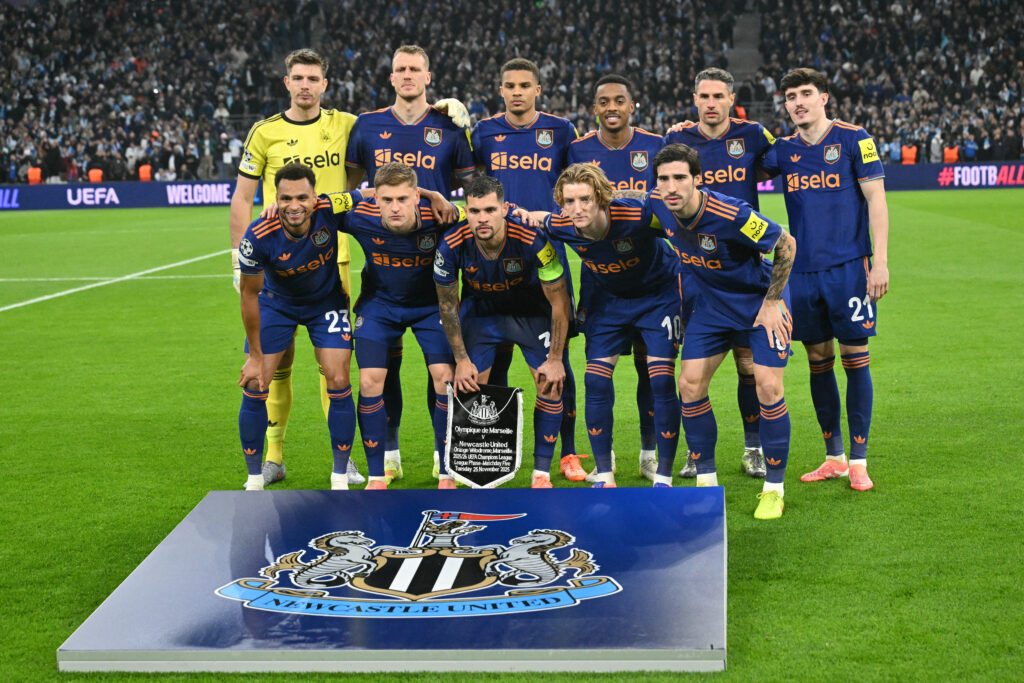 Newcastle United's starting XI pose for a photo before facing Marseille.