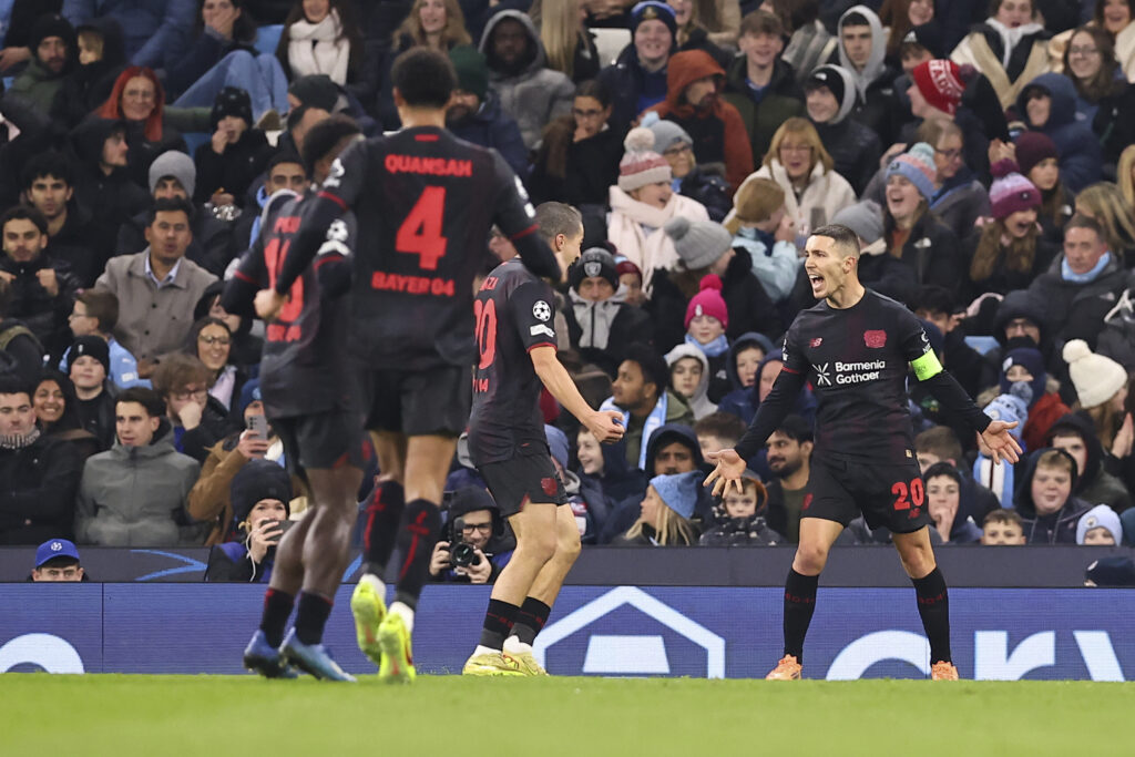 Bayer Leverkusen celebrate scoring against Manchester City in the Champions League.