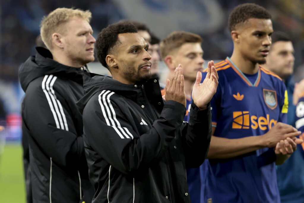 Newcastle United players applaud supporters after losing to Marseille in the Champions League at the Stade Velodrome.