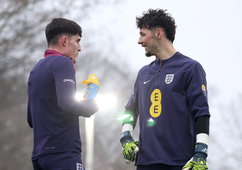 James Trafford and Tino Livramento talk during an England training session at St George's Park.