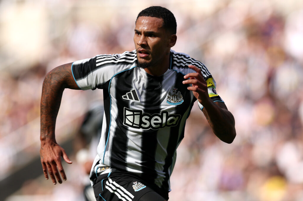 Jamaal Lascelles playing for Newcastle United against Atletico Madrid.