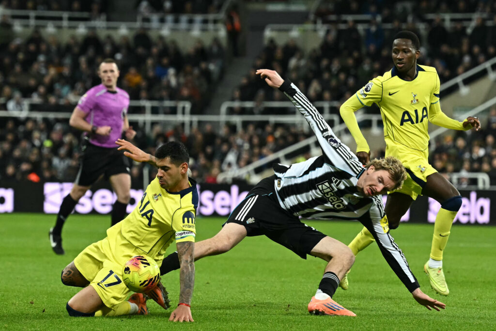 Nick Woltemade loses the ball to Cristian Romero during Newcastle United vs Tottenham Hotspur.