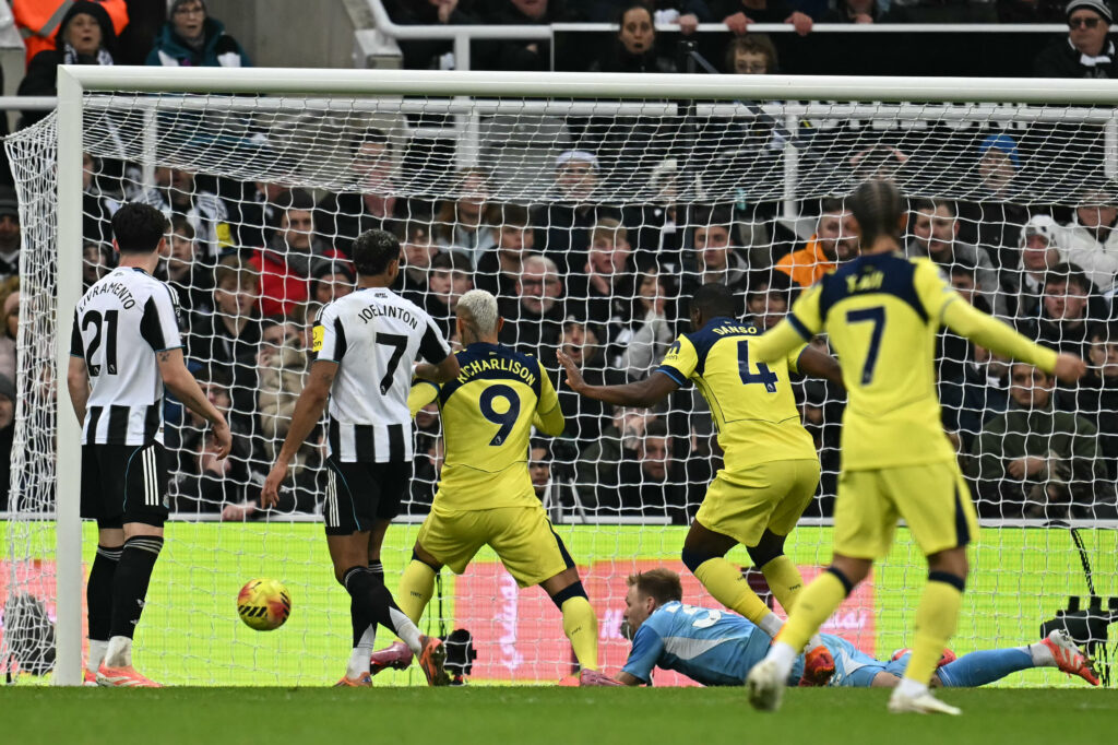 Aaron Ramsdale watches on as Cristian Romero scores for Tottenham against Newcastle United.