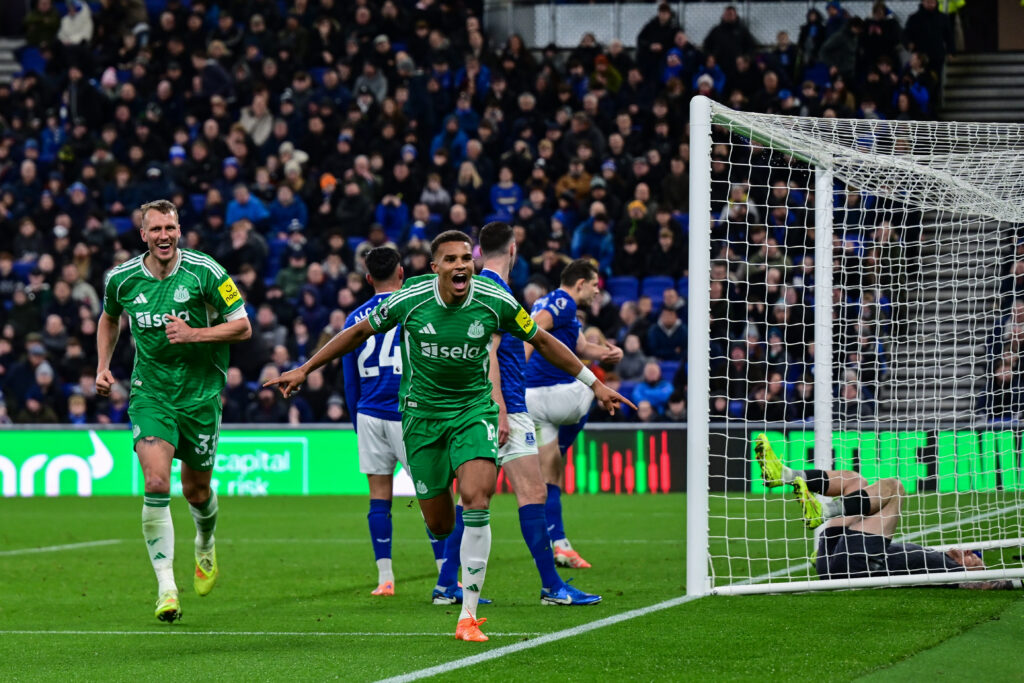 Malick Thiaw celebrates scoring for Newcastle United against Everton.