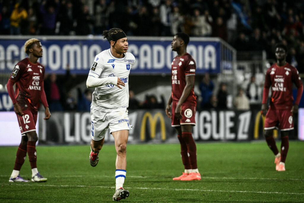 Kevin Danois celebrates scoring for Auxerre against Metz.