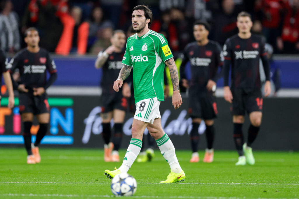 Sandro Tonali looks dejected after Newcastle United concede a goal against Bayer Leverkusen.