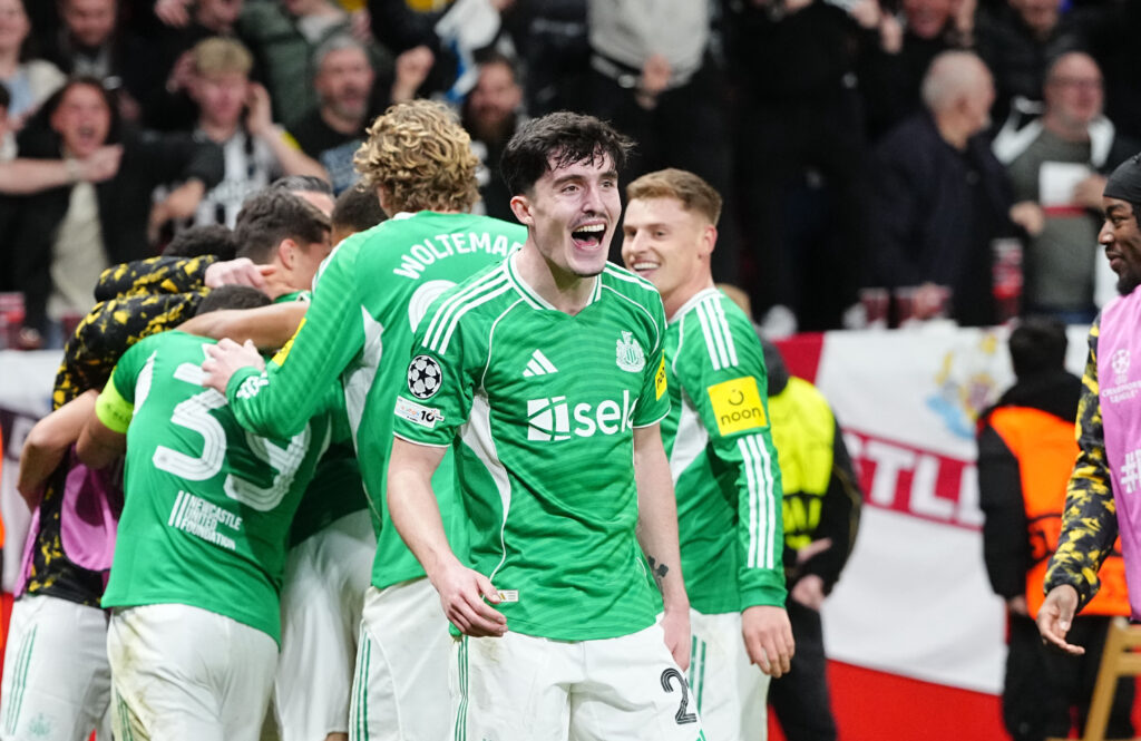 Tino Livramento celebrates after Newcastle United score against Bayer Leverkusen in the Champions League.